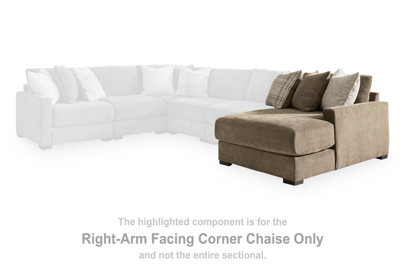 Ashley Furniture Camellia-Court double chaise sectional with plush fabric, featuring a spacious L-shaped design and modern style.
