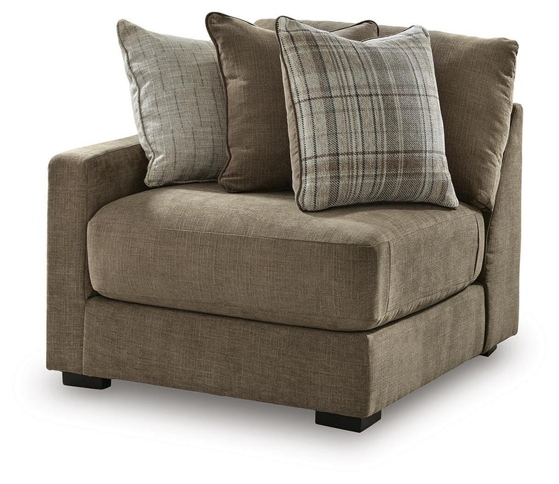 Ashley Furniture Camellia-Court sectional sofa, angled view showing plush cushions, fabric upholstery, and modern sectional design.