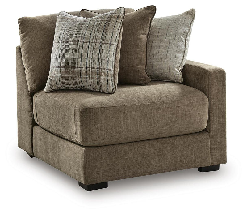 Ashley Furniture Camellia-Court sectional with chaise, showing the angled view of the fabric sofa with modern design and plush cushions.