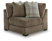 Ashley Furniture Camellia-Court sectional with chaise, showing the head-on view of the modern fabric sofa and chaise lounge.