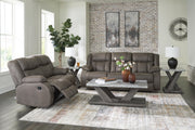 Ashley Furniture First Base living room set featuring a plush sofa and matching armchair in a contemporary design.