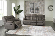 Ashley Furniture First Base living room set with sofa and armchair, beige upholstery and modern design.