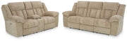 Ashley Furniture Tip-Off 2-piece living room set with a sofa and loveseat in a modern fabric, shown in a cozy living space.