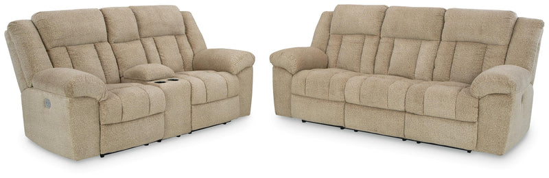 Ashley Furniture Tip-Off 2-piece living room set with a sofa and loveseat in a modern fabric, shown in a cozy living space.