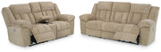 Open Ashley Furniture Tip-Off 2-piece living room set with a sofa and armchair, featuring modern upholstery and stylish design.