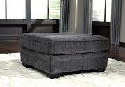 Ashley Furniture Tracling living room set with sofa and loveseat featuring neutral upholstery and modern design.