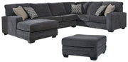 Ashley Furniture Tracling living room set with sofa, loveseat, and armchair in a modern design, featuring neutral upholstery.