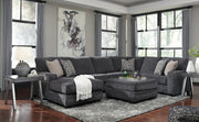 Ashley Furniture Tracling living room set with sofa and armchair, featuring neutral upholstery and modern design.