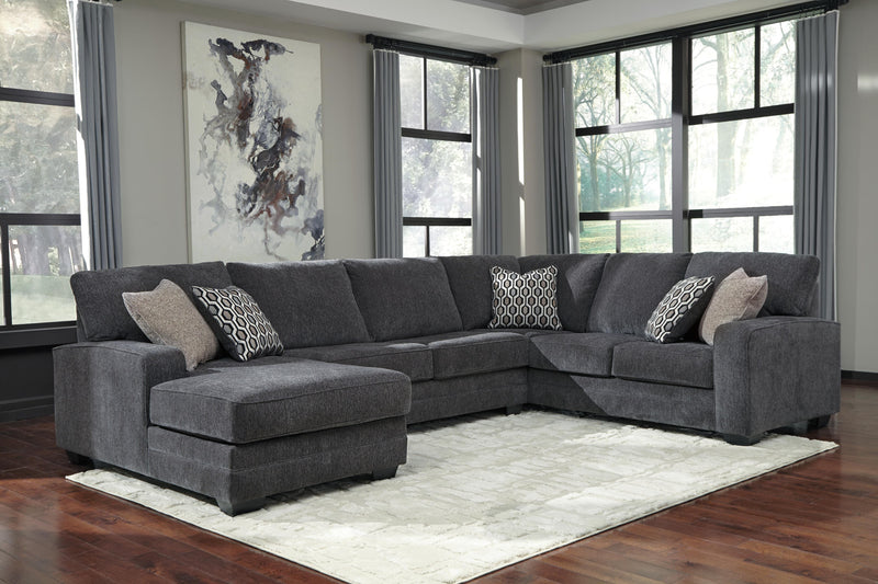 Ashley Furniture Tracling living room set featuring a sofa, loveseat, and coffee table in a modern design.