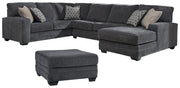 Ashley Furniture Tracling Living Room Set with sofa and loveseat in neutral fabric, stylish and comfortable for modern living rooms.