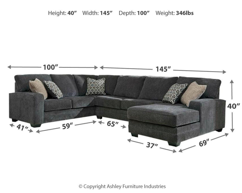 Ashley Furniture Tracling living room set with upholstered sofa and matching armchair, modern design and neutral fabric.