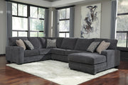 Ashley Furniture Tracling living room set with sofa and armchair, featuring neutral fabric upholstery and modern design.