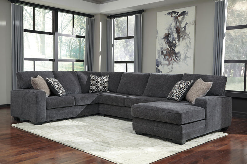 Ashley Furniture Tracling living room set with sofa and armchair, featuring neutral fabric upholstery and modern design.