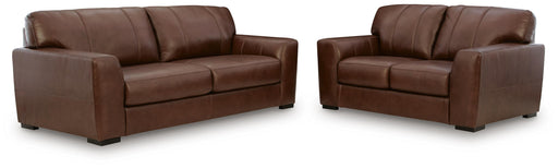 Ashley Furniture Brogliano living room set featuring a sofa and loveseat with beige upholstery and modern design.