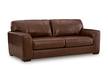 Ashley Furniture Brogliano living room set with sofa and armchair, featuring neutral upholstery and modern design.