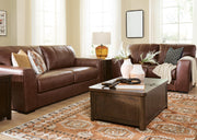 Ashley Furniture Brogliano living room set with sofa and armchair, featuring neutral upholstery and modern design.