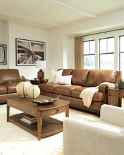 Ashley Furniture Saonara living room set with sofa and armchair in a modern, stylish design, shown in a cozy living space.