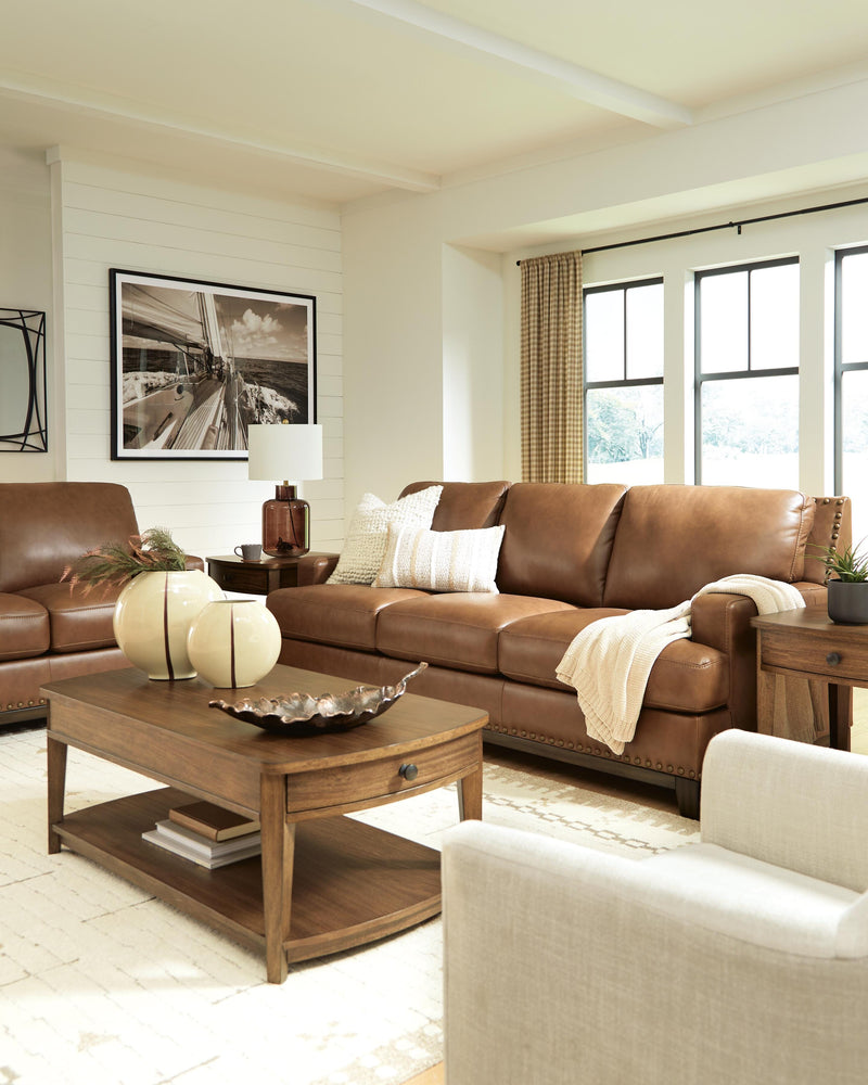 Ashley Furniture Saonara living room set with sofa and armchair in a modern, stylish design, shown in a cozy living space.