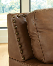 Ashley Furniture Saonara living room set featuring a sofa with stitch and nailhead details, stylish and comfortable for modern living rooms.