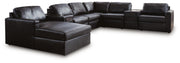 Ashley Furniture Modmax II sectional with chaise and built-in audio consoles, showcasing plush upholstery and modern design.