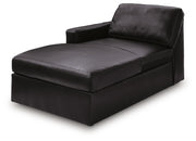 Ashley Furniture Modmax II sectional sofa with chaise, shown from an angled view featuring plush cushions and modern design.