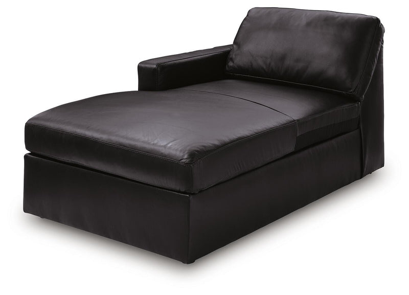 Ashley Furniture Modmax II sectional sofa with chaise, shown from an angled view featuring plush cushions and modern design.