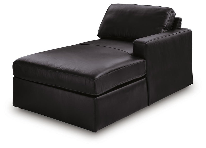 Ashley Furniture Modmax II sectional sofa with chaise, showing a stylish, modern sectional with plush cushions and fabric upholstery.
