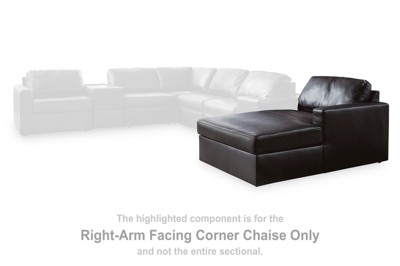 Ashley Furniture Modmax II sectional with chaise and built-in audio consoles, showcasing plush seating and modern design.