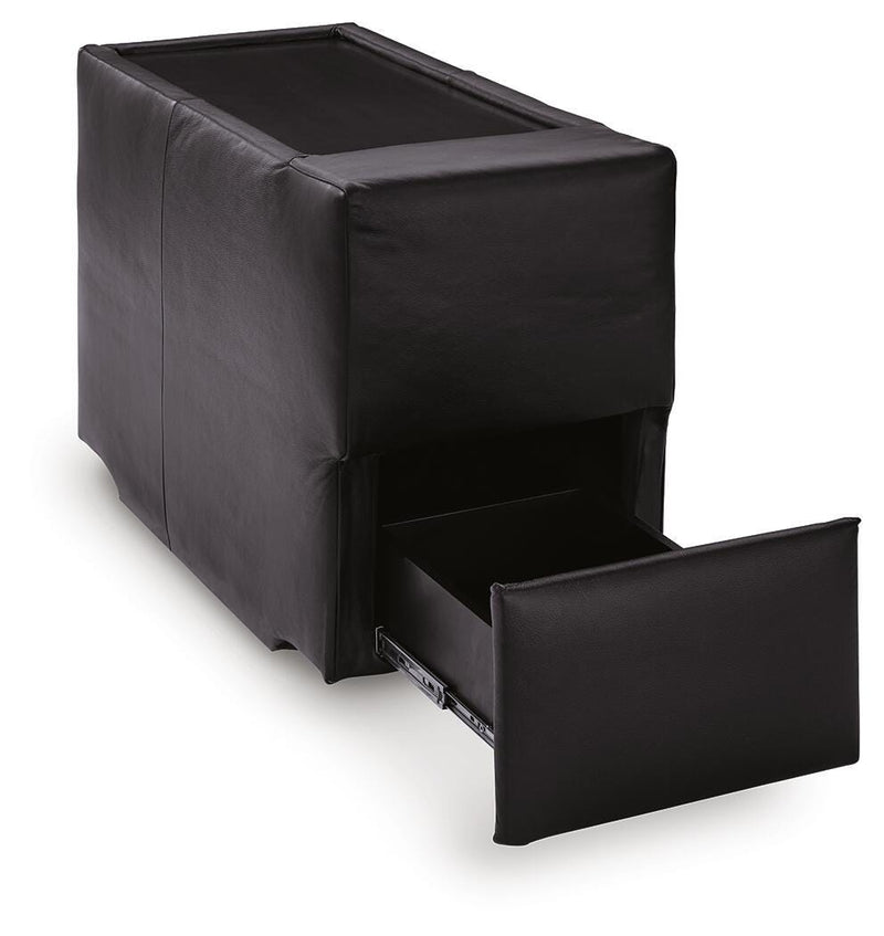 Ashley Furniture Modmax II sectional sofa with storage console, shown from an angled open view highlighting its spacious design.