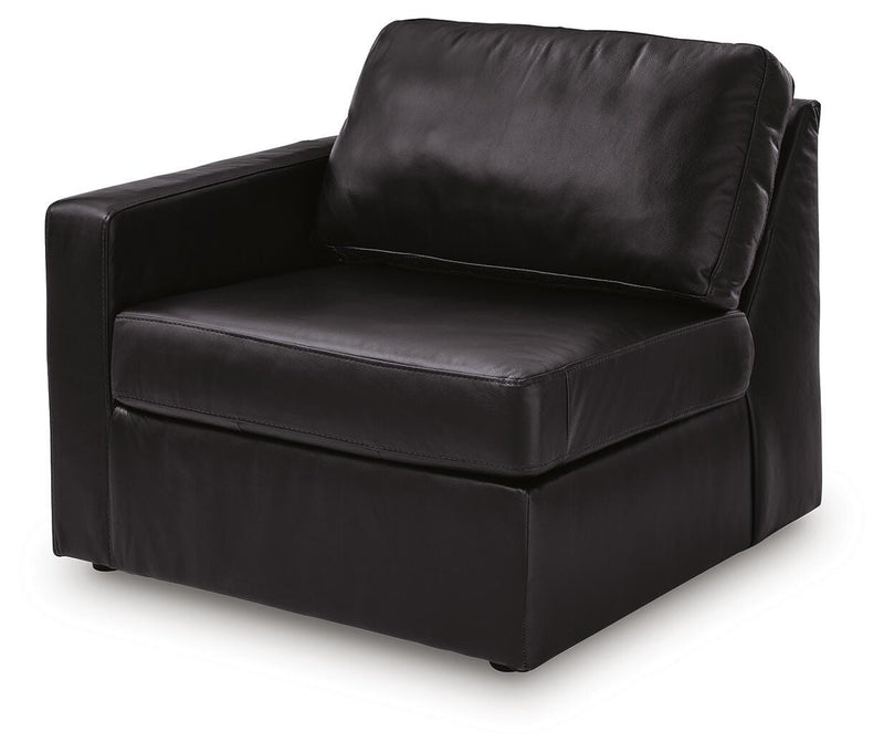Ashley Furniture Modmax II sectional sofa with storage console, showcasing plush cushions and modern design from an angled view.