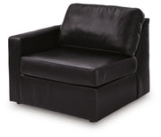 Ashley Furniture Modmax II sectional sofa with chaise, showing its modern design and comfortable seating from an angled view.