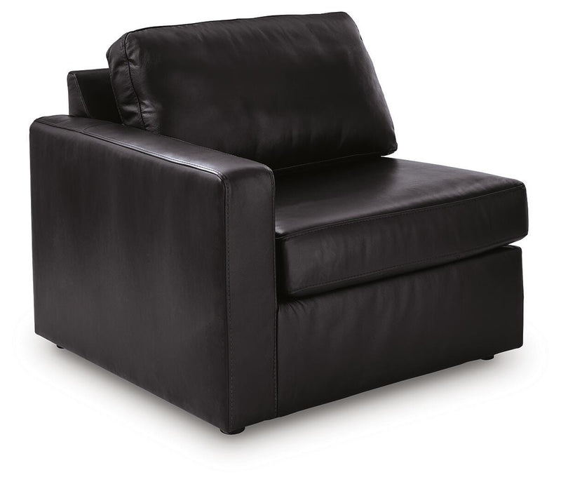 Ashley Furniture Modmax II sectional sofa shown from an angled view, featuring modern design and plush seating in a spacious living room.