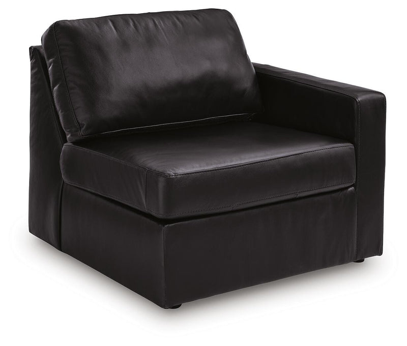 Ashley Furniture Modmax II sectional with chaise and audio consoles, showing a modern L-shaped sofa in a stylish living room.
