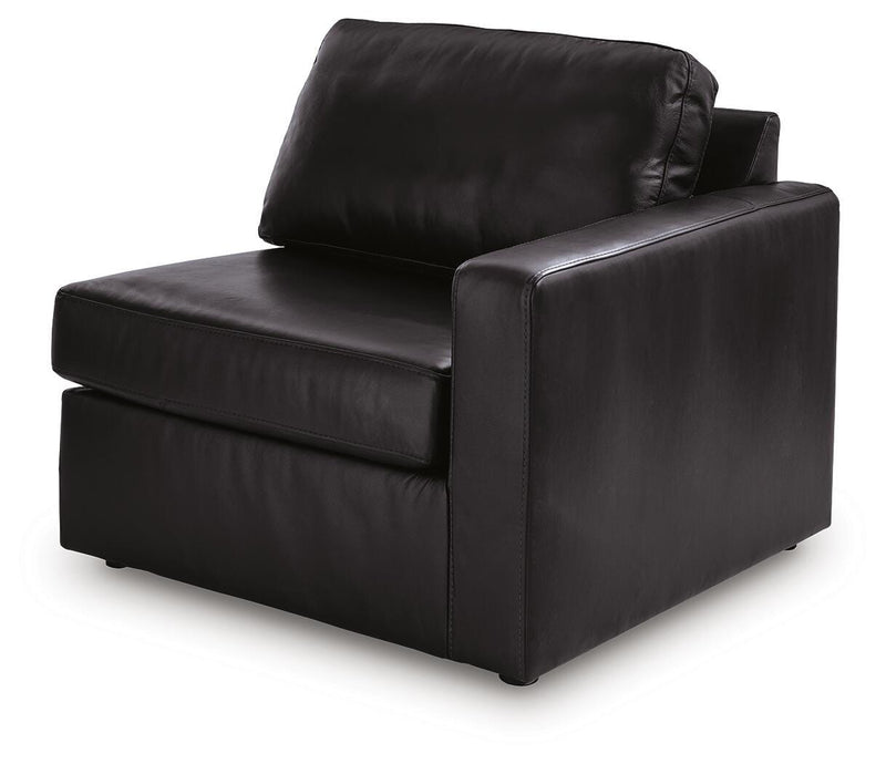 Ashley Furniture Modmax II sectional sofa chaise with plush cushions and modern design, shown from an angled view.