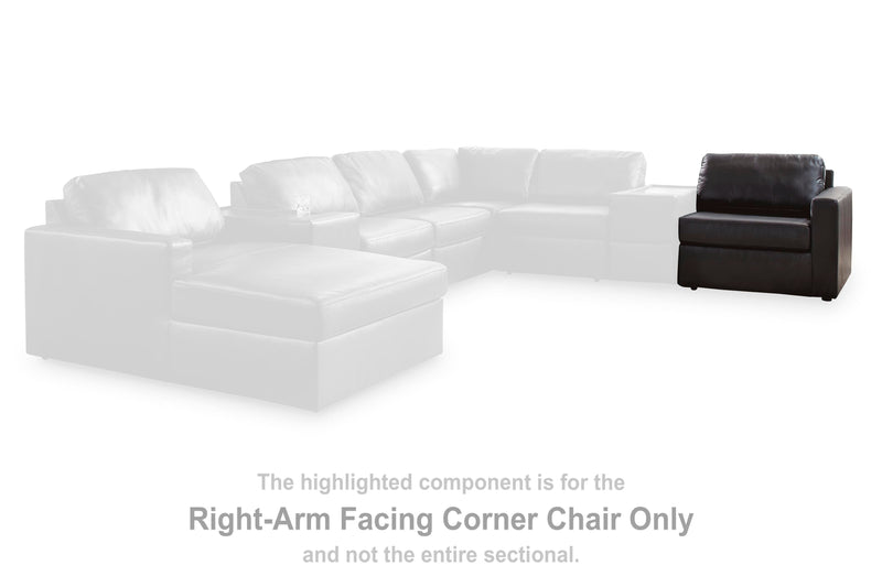 Ashley Furniture Modmax II sectional with chaise and audio consoles, featuring plush upholstery and modern design.