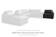 Ashley Furniture Modmax II sectional sofa with chaise in a modern living room setting, featuring plush upholstery and reclining sections.