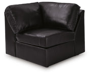 Ashley Furniture Modmax II sectional with chaise and storage consoles, showing plush fabric, modern design, and built-in storage features.