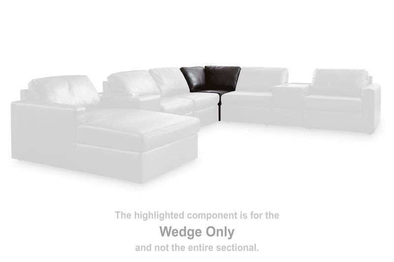 Ashley Furniture Modmax II sectional with chaise and built-in storage consoles, featuring plush cushions and modern design.