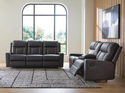 Ashley Furniture Mackmenville living room set with sofa, loveseat, and coffee table in a modern, stylish design.