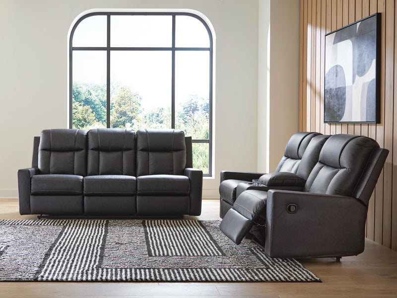 Ashley Furniture Mackmenville living room set with sofa, loveseat, and coffee table in a modern, stylish design.