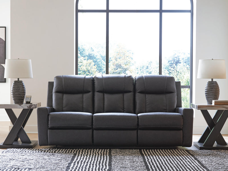 Ashley Furniture Mackmenville living room set featuring a sofa, loveseat, and armchair with neutral fabric upholstery.