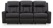 Ashley Furniture Mackmenville living room set includes a sofa and loveseat with neutral upholstery and plush cushions.