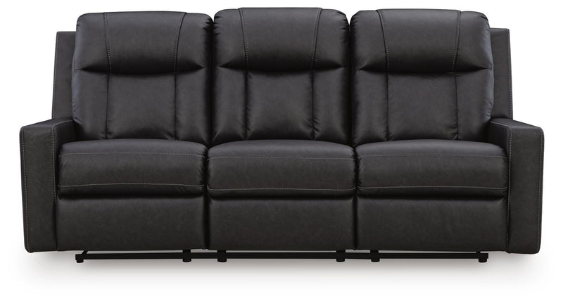 Ashley Furniture Mackmenville living room set includes a sofa and loveseat with neutral upholstery and plush cushions.