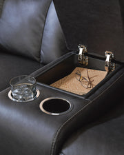 Ashley Furniture Mackmenville living room set with sofa and matching console table in a modern design.