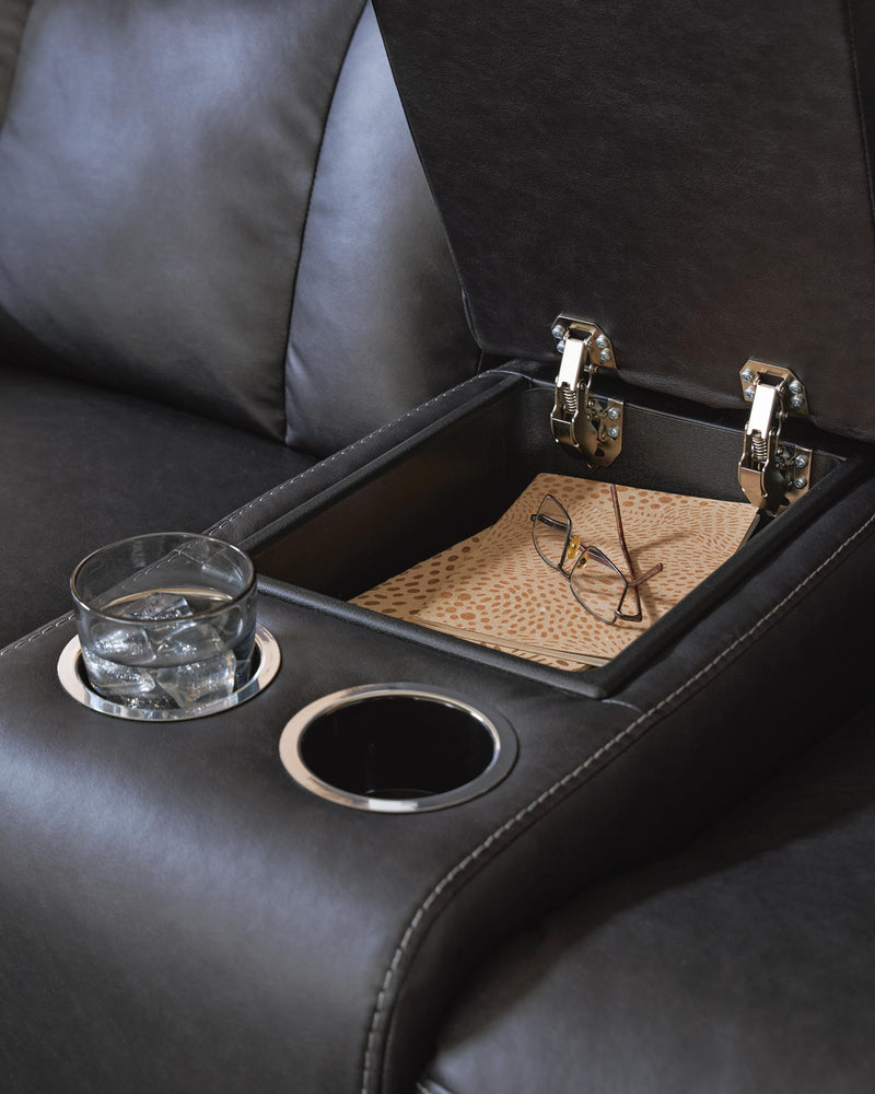 Ashley Furniture Mackmenville living room set with sofa and matching console table in a modern design.