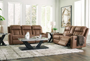 Ashley Furniture Mackmenville living room set with sofa and loveseat in a modern design, featuring neutral upholstery and wooden legs.