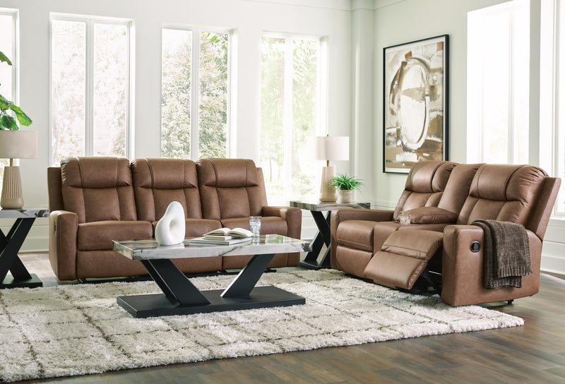 Ashley Furniture Mackmenville living room set with sofa and loveseat in a modern design, featuring neutral upholstery and wooden legs.