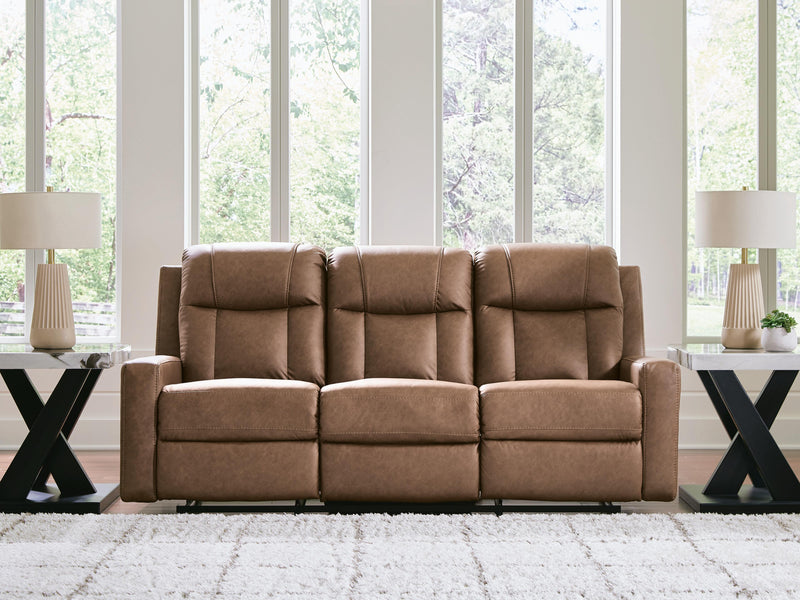 Ashley Furniture Mackmenville living room set featuring a sofa and loveseat with neutral fabric upholstery and modern design.