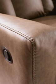 Ashley Furniture Mackmenville living room set featuring a sofa and loveseat with plush cushions and neutral upholstery.