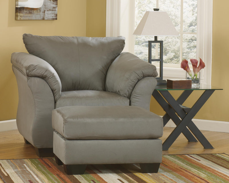 Ashley Furniture Darcy living room set with sofa and loveseat, featuring plush upholstery and modern design.